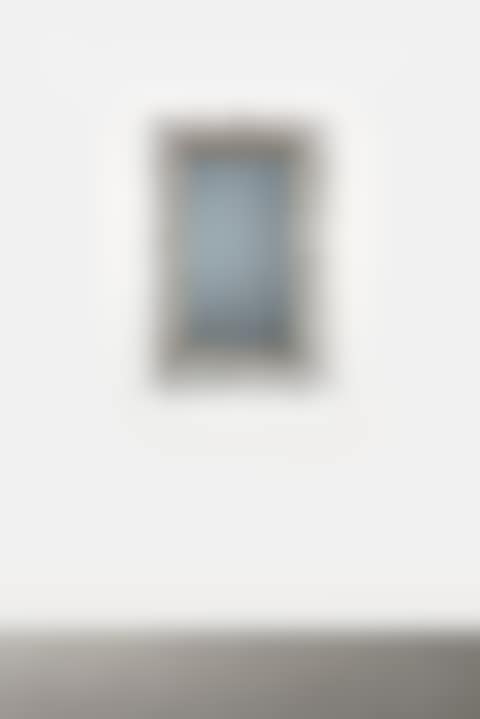 A WALL-MOUNTED MIRROR (preview)