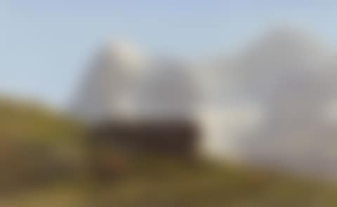 Cows in the meadow in front of the Eiger and Jungfrau. (preview)